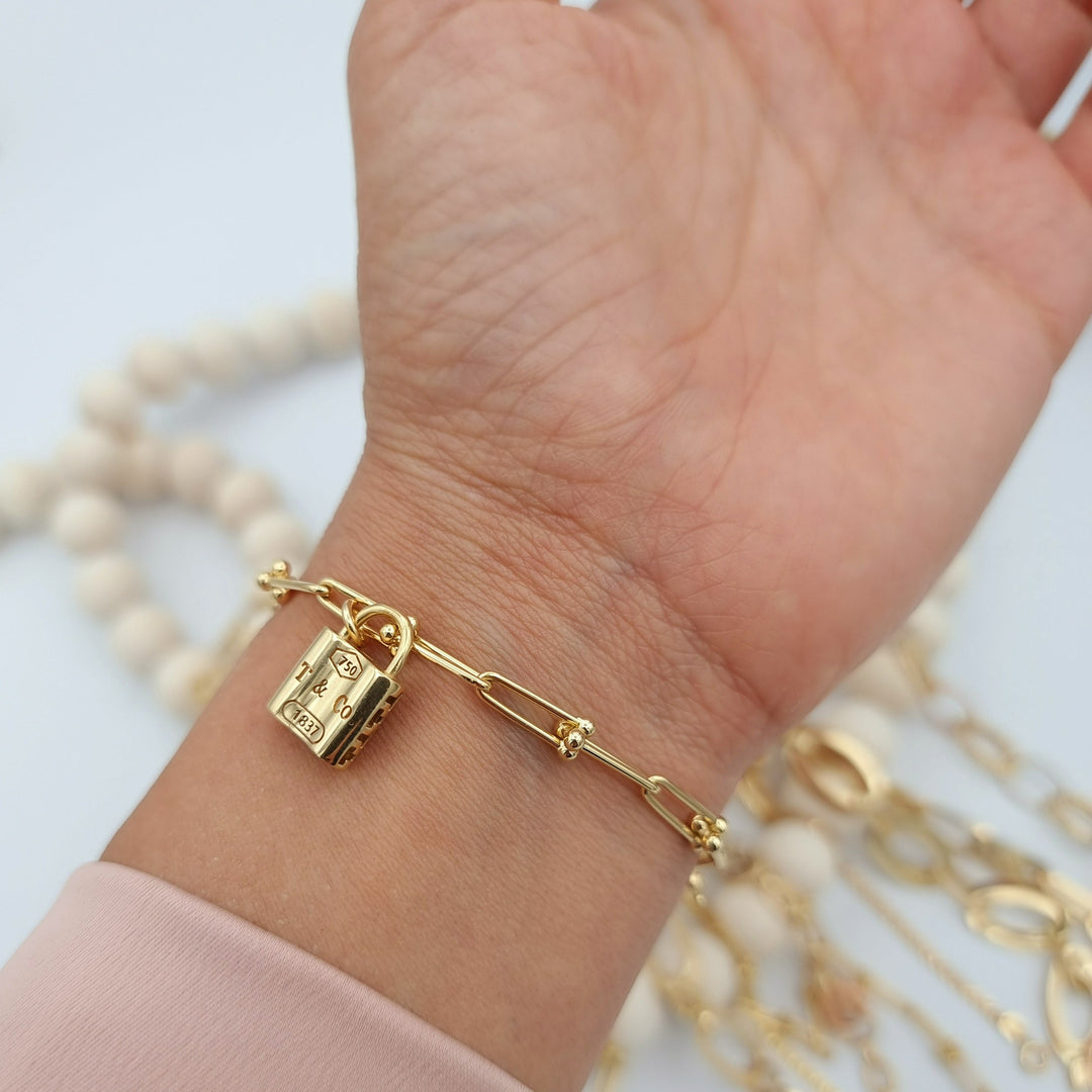 Gold-Tone Titanium Snap Lock Bracelet | In stock! | Lucleon